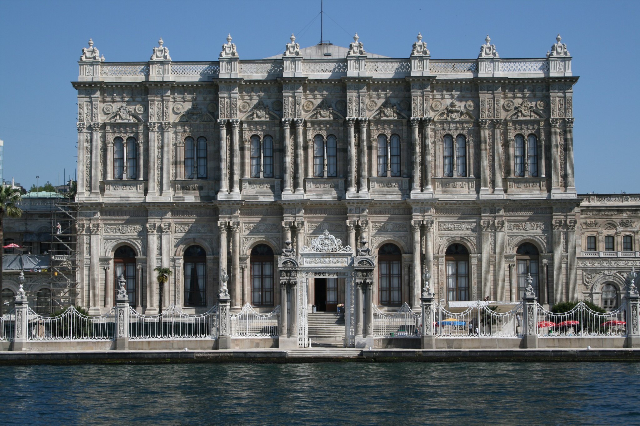 Dolmabahce Palace from the water, its terrace and gates running along the shore