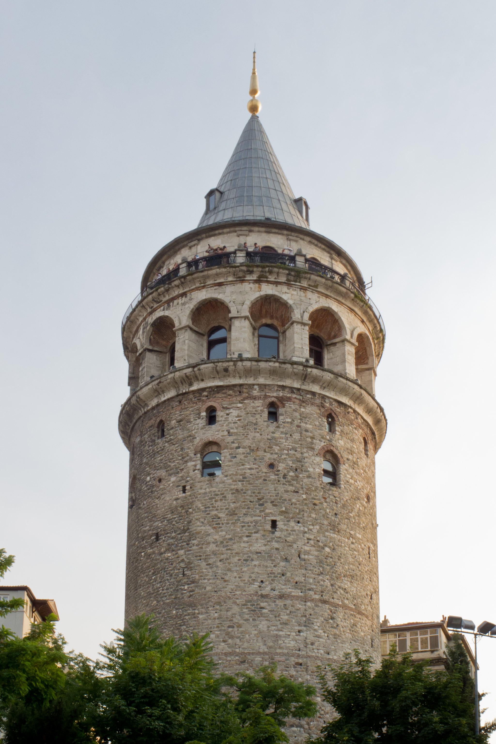 The Galata Tower in full, its stone drum and conical cap against an open sky