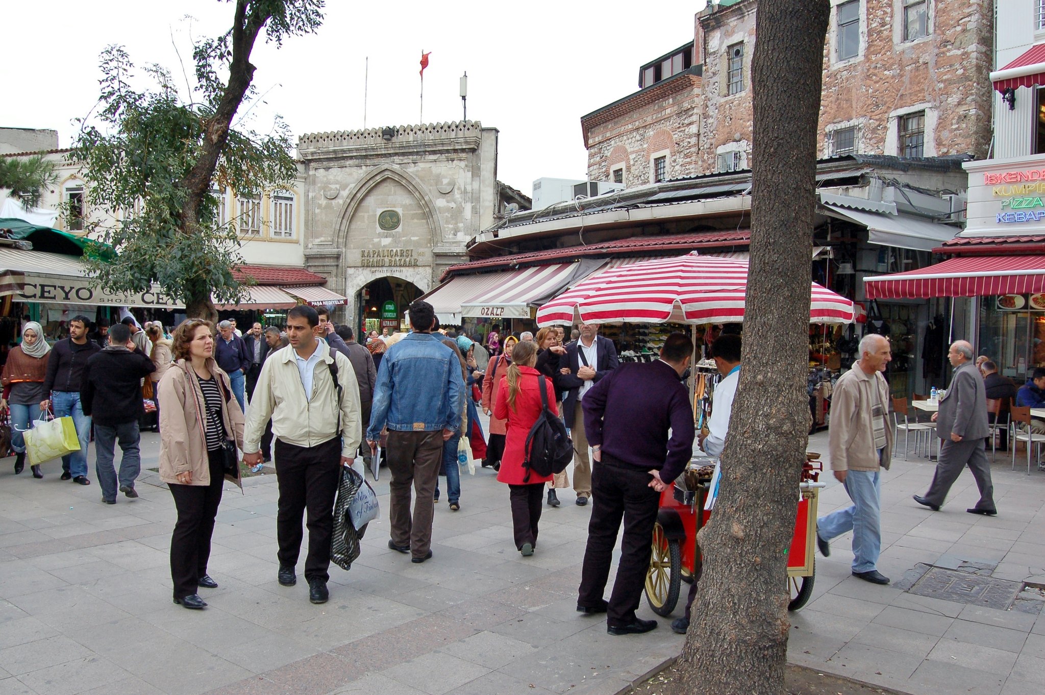 One of the Grand Bazaar's outer gates, with the crowd spilling into the street market outside