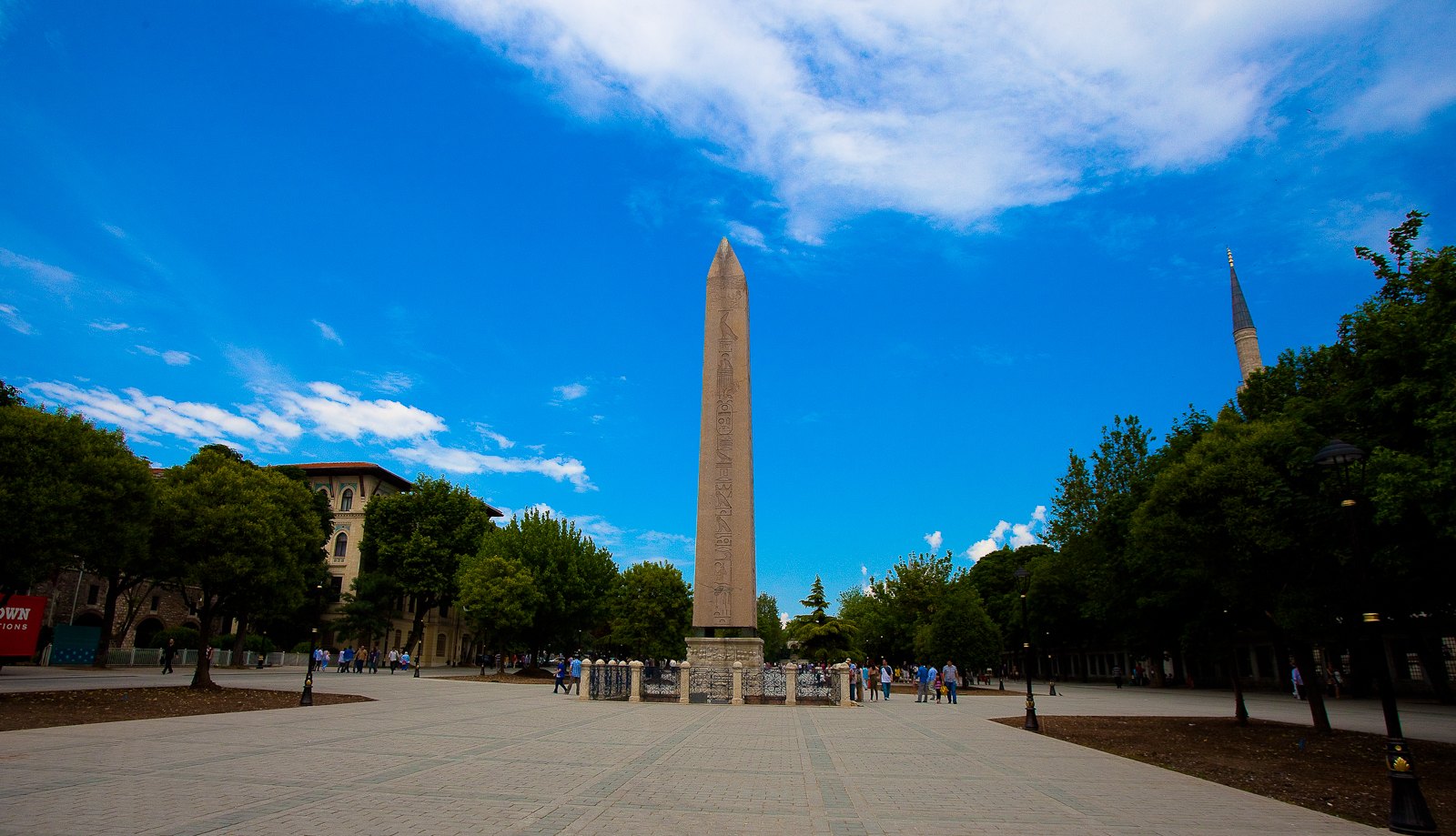 The Obelisk of Theodosius standing in the open square of the Hippodrome, minarets behind it