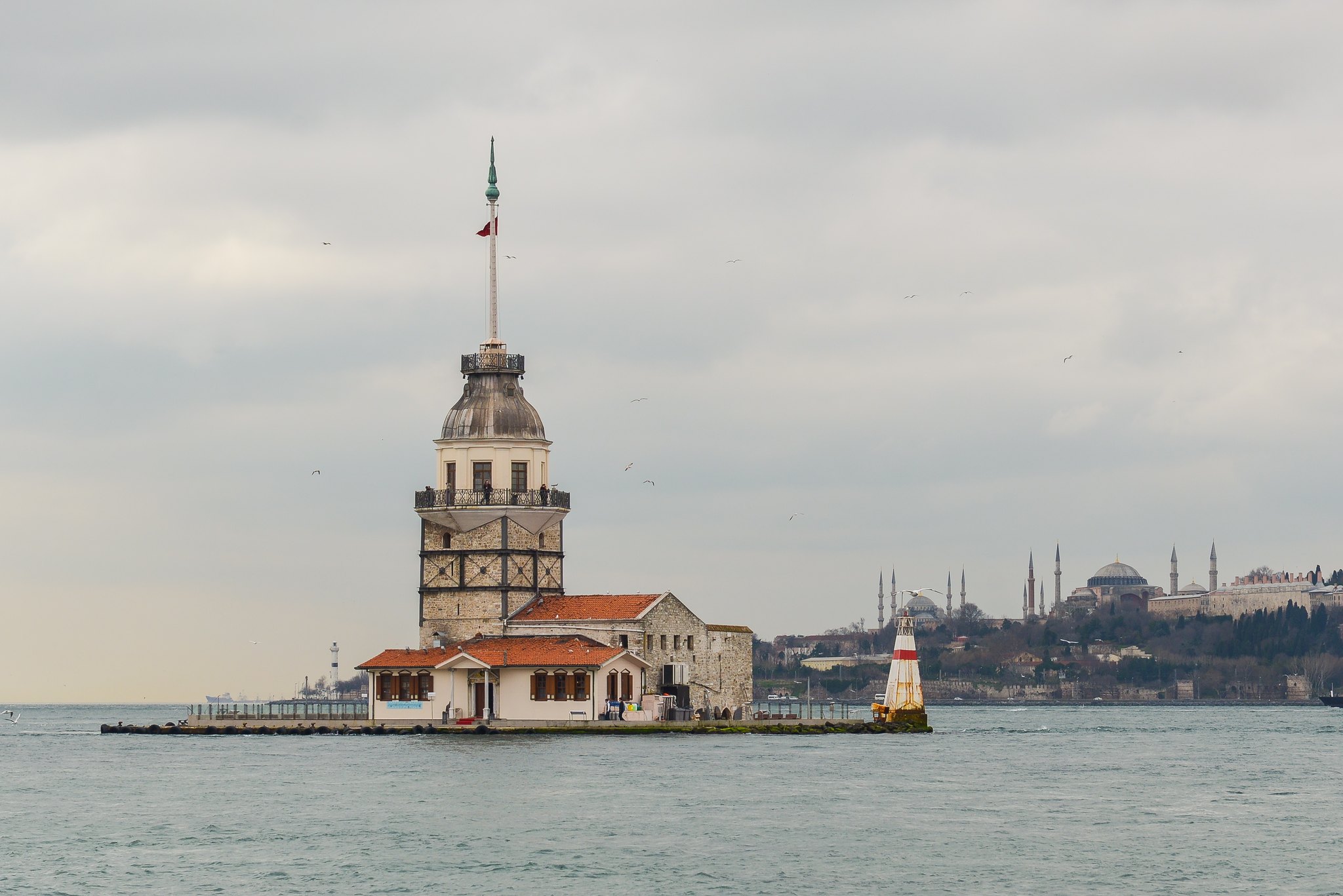 The Maiden's Tower on its islet with the old city and its minarets on the skyline behind