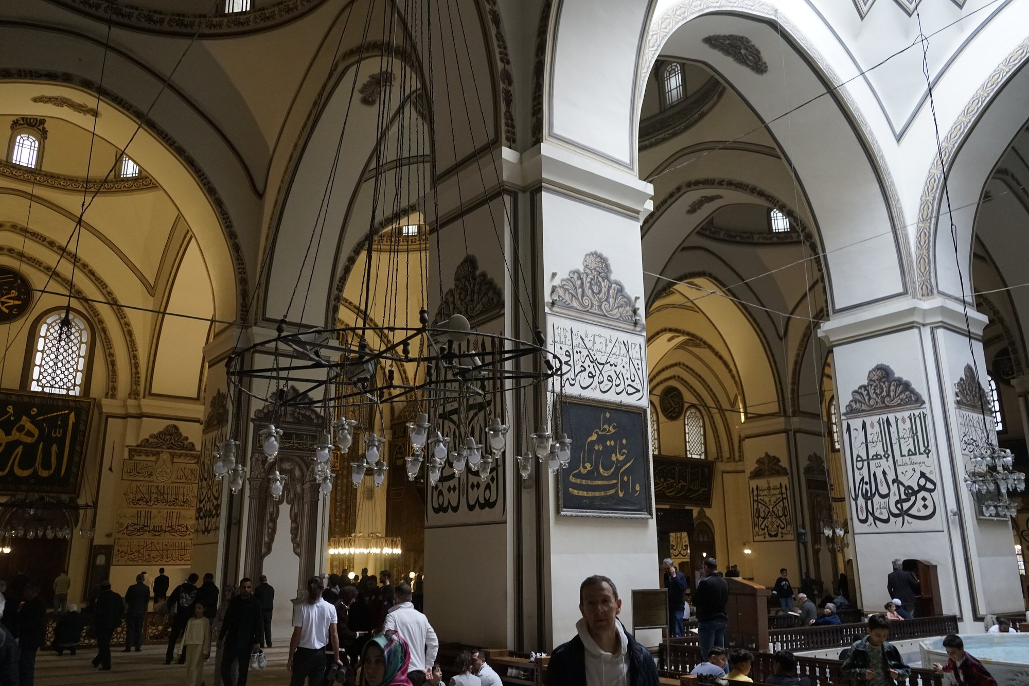 Inside the Great Mosque at Bursa, its rows of piers and low domes seen from the north east