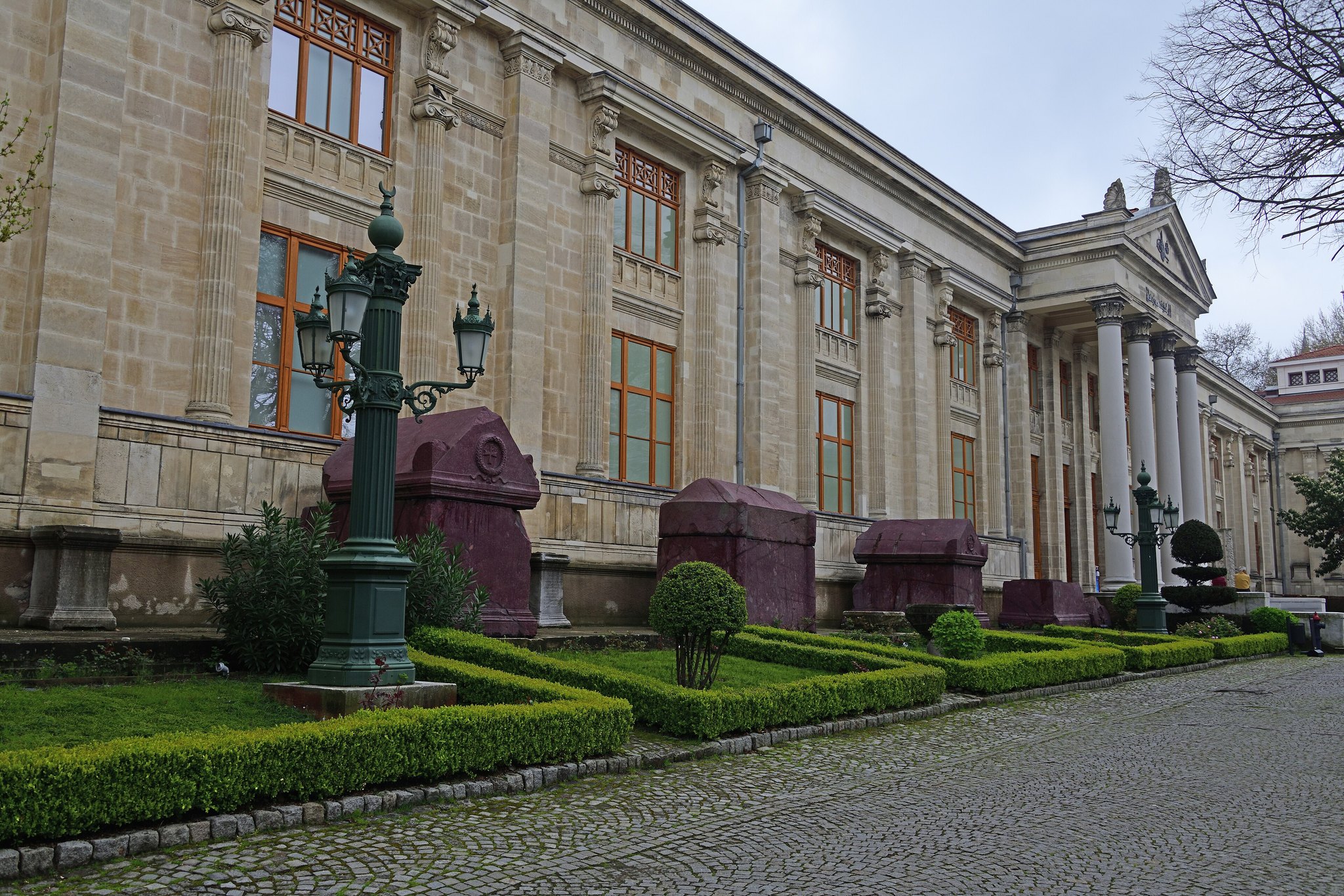 The neoclassical main building of the Istanbul Archaeological Museum behind its garden