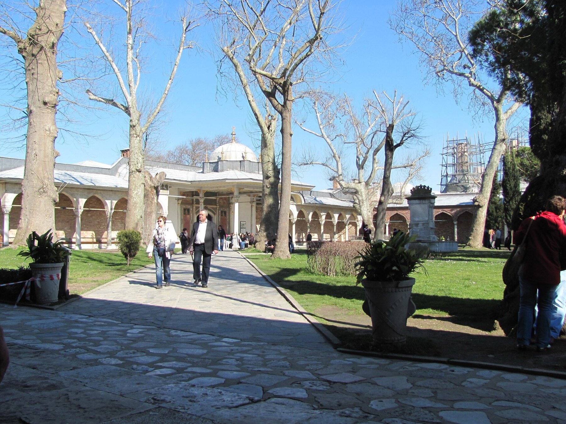 A pavilion façade at Topkapi Palace, carved stone window surrounds in pale limestone